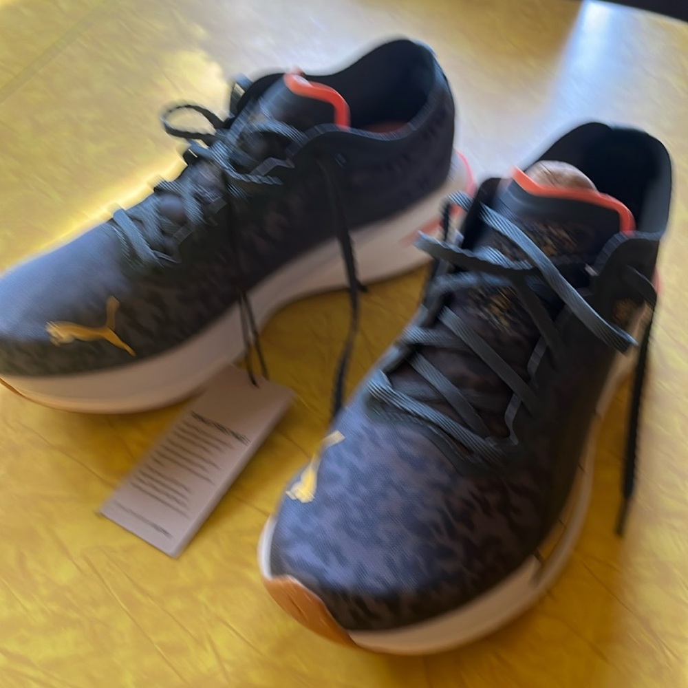 Brand new never worn PumaNitro sneakers.  Men’s size 10